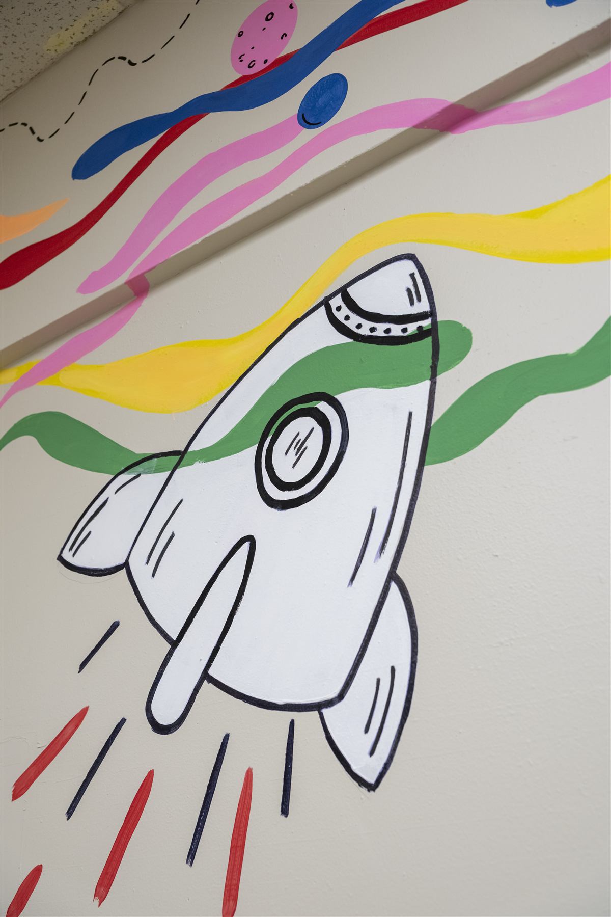 Hand-painted rocket mural